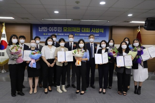 난민이주민모의재판단체사진.jpg